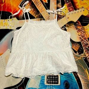 A 3X, white tie up spaghetti straps with flower print shirt/ blouse.